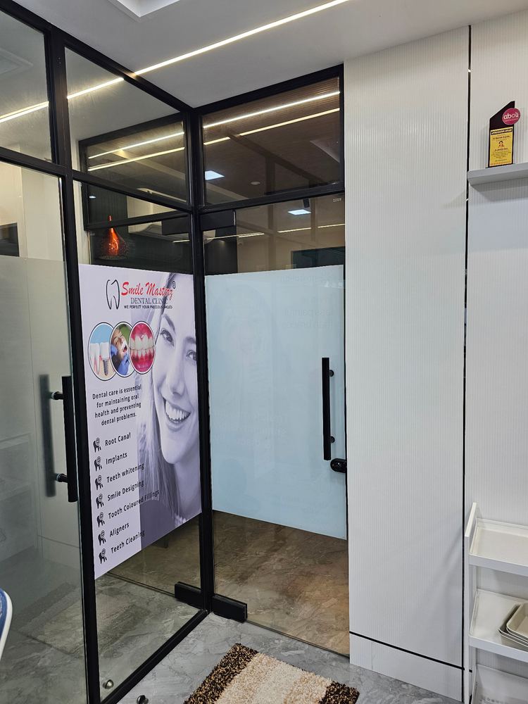 Glass entrance to Smile Masterz Dental Clinic, Borivali West